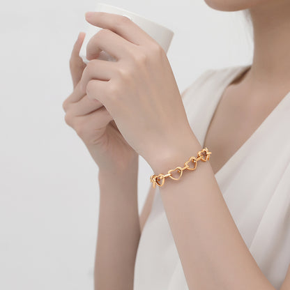 Heartbeat of Love Bracelet | Moving Heart Links in 14K Gold & Rose Gold | An Everlasting Symbol of Your Connection