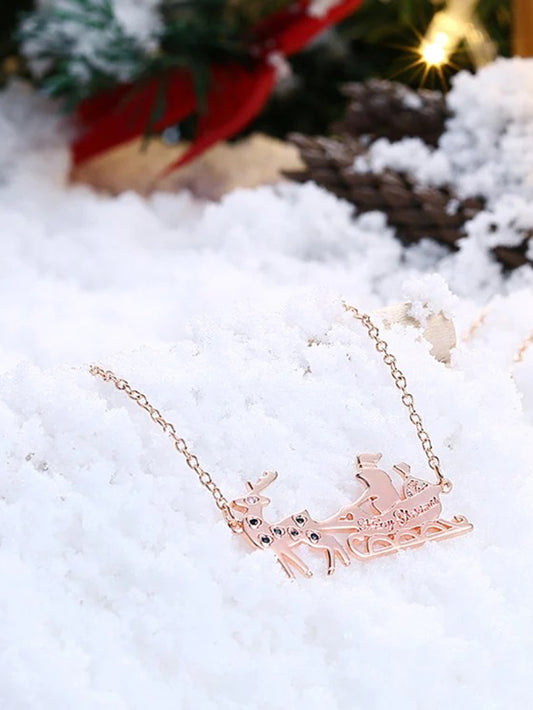 Stainless Steel Sled Car Necklace, adorned with dazzling crystals. Stylish and durable, it's a perfect addition to any outfit