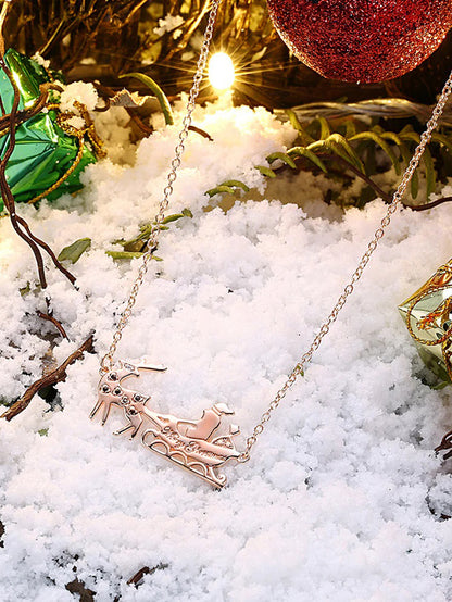 Stainless Steel Sled Car Necklace, adorned with dazzling crystals. Stylish and durable, it's a perfect addition to any outfit